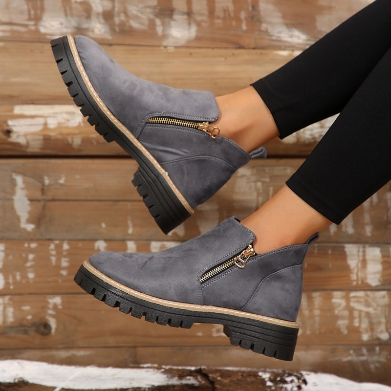 ZipStryde Sleek Zip Ankle Boots - angled front view of women's zip ankle boot